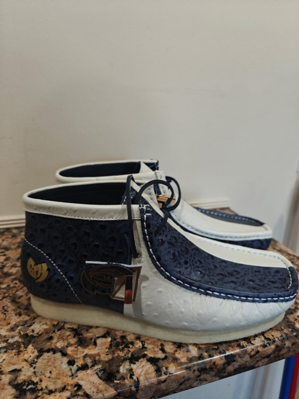 Navy and White Leather Moccasin Boots